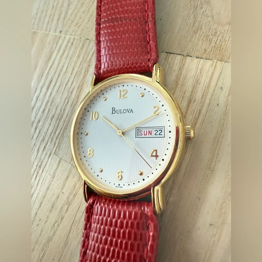 Bulova gold tone red leather watch NEW BATTERY